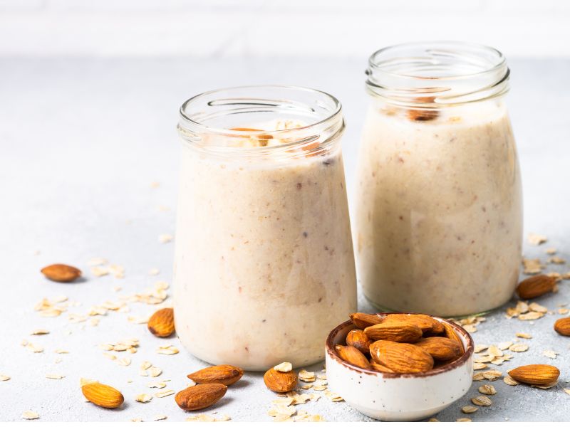 Almond Butter Smoothies in Glass Jars on a table