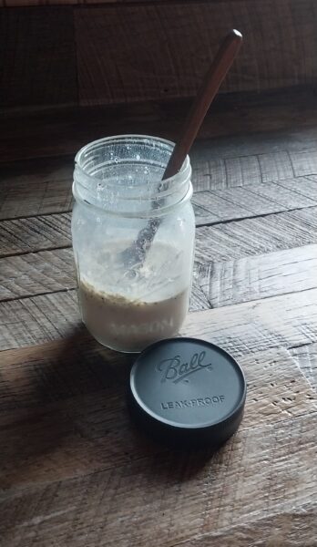 fresh protein mix in a Ball Jar on a wooden counter