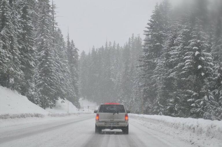 Car on Snowy Road