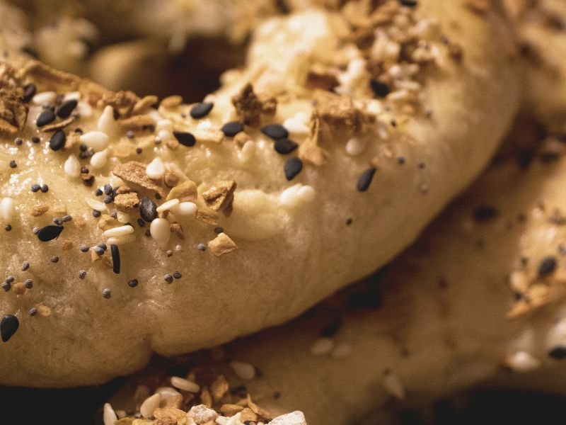a bagel with everything seasoning mix sprinkled on the top