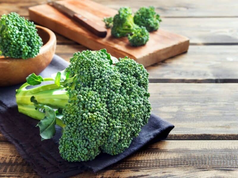 farm fresh broccoli on a cutting board