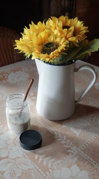 jar of fresh ground protein mix in a Ball jar on a breakfast table