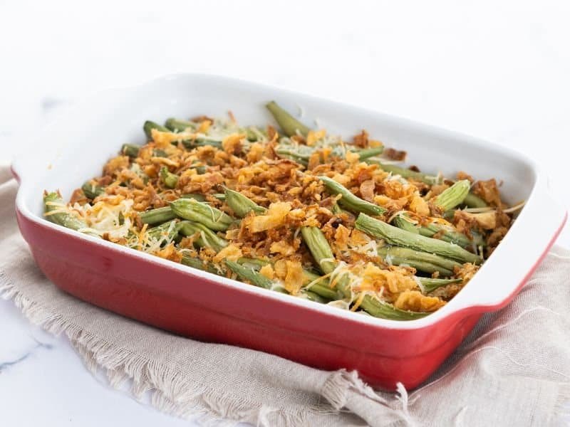 Delicious green bean casserole with crispy fried onions and fresh green beans.