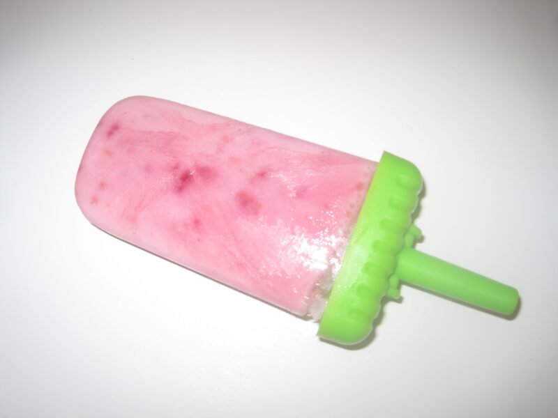 Homemade Kefir Popsicles laying on the counter