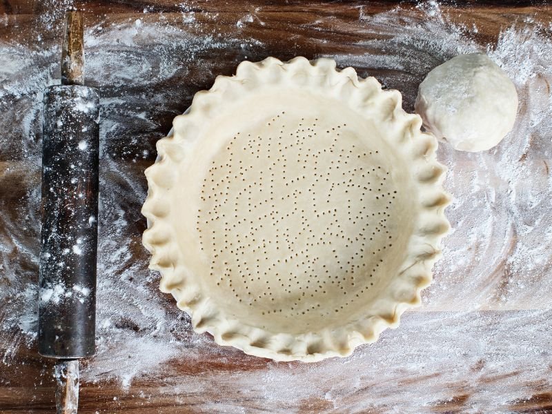 pricking a baked pie shell before baking