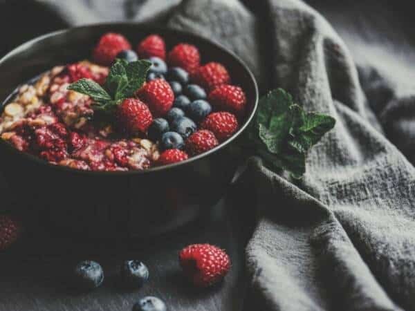 bowl of berries and oats for breakfast
