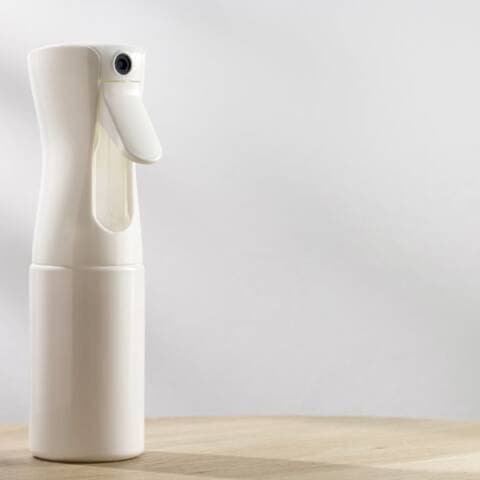 Spray bottle of DIY Daily Shower Cleaner