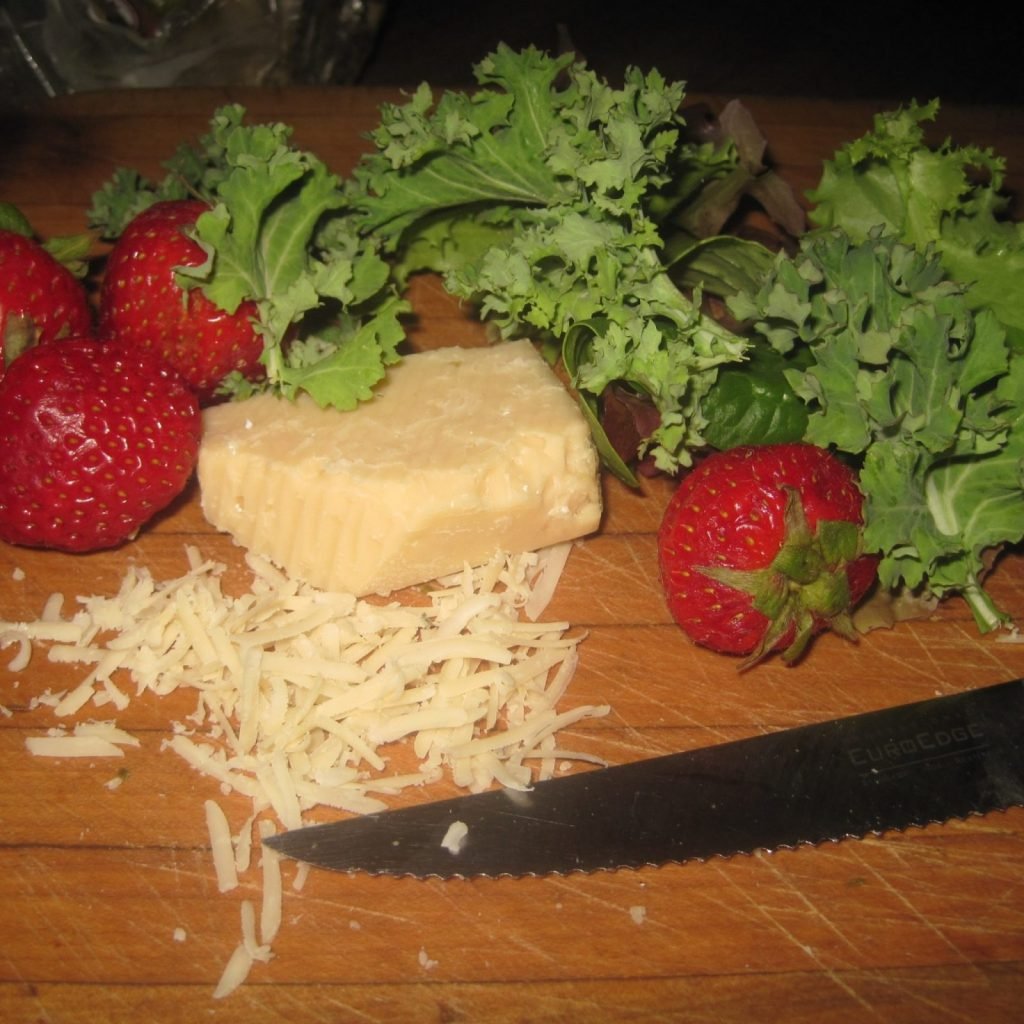 This is a easy Strawberry and Kale Salad Recipe with Parmesan Cheese with optional Bacon.