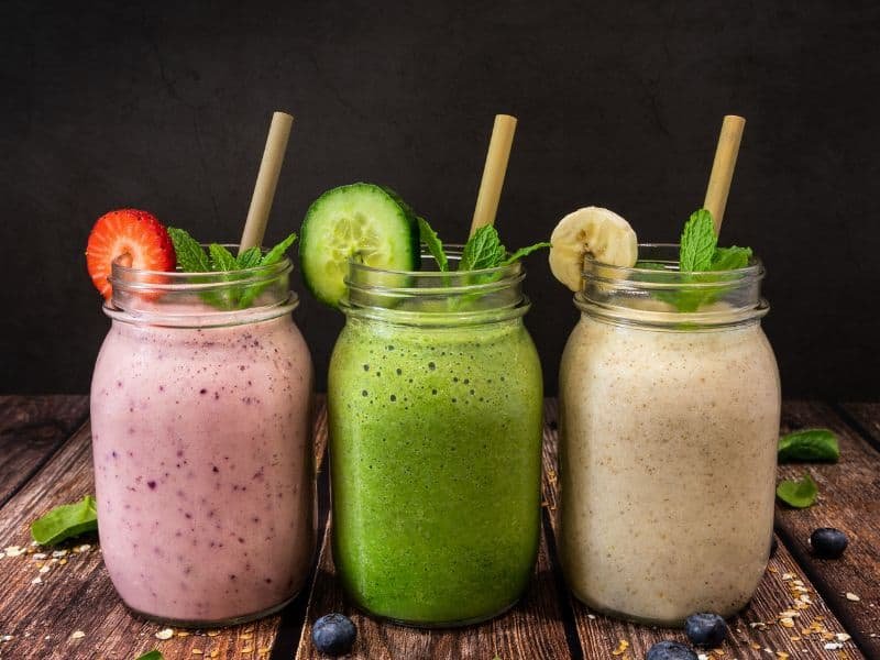 three jars of fresh protean powder shakes